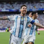 Messi faz história e Argentina vence a Argélia na estreia da Copa do Mundo