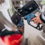 Car refueling at fuel station