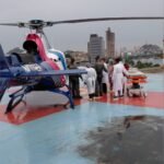 Mulher de 68 anos é atingida por coqueiro e resgatada de helicóptero no ES